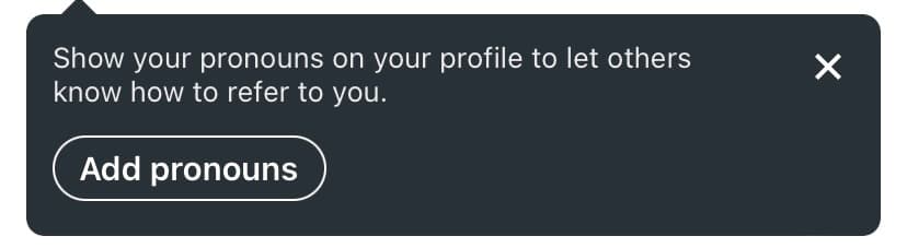 Dark LinkedIn tooltip saying Show your pronouns on your profile, with an Add pronouns button and a close icon